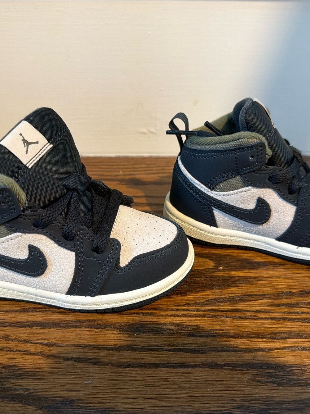 Jordan Kids Black and White High-Top Sneakers with Navy Accents